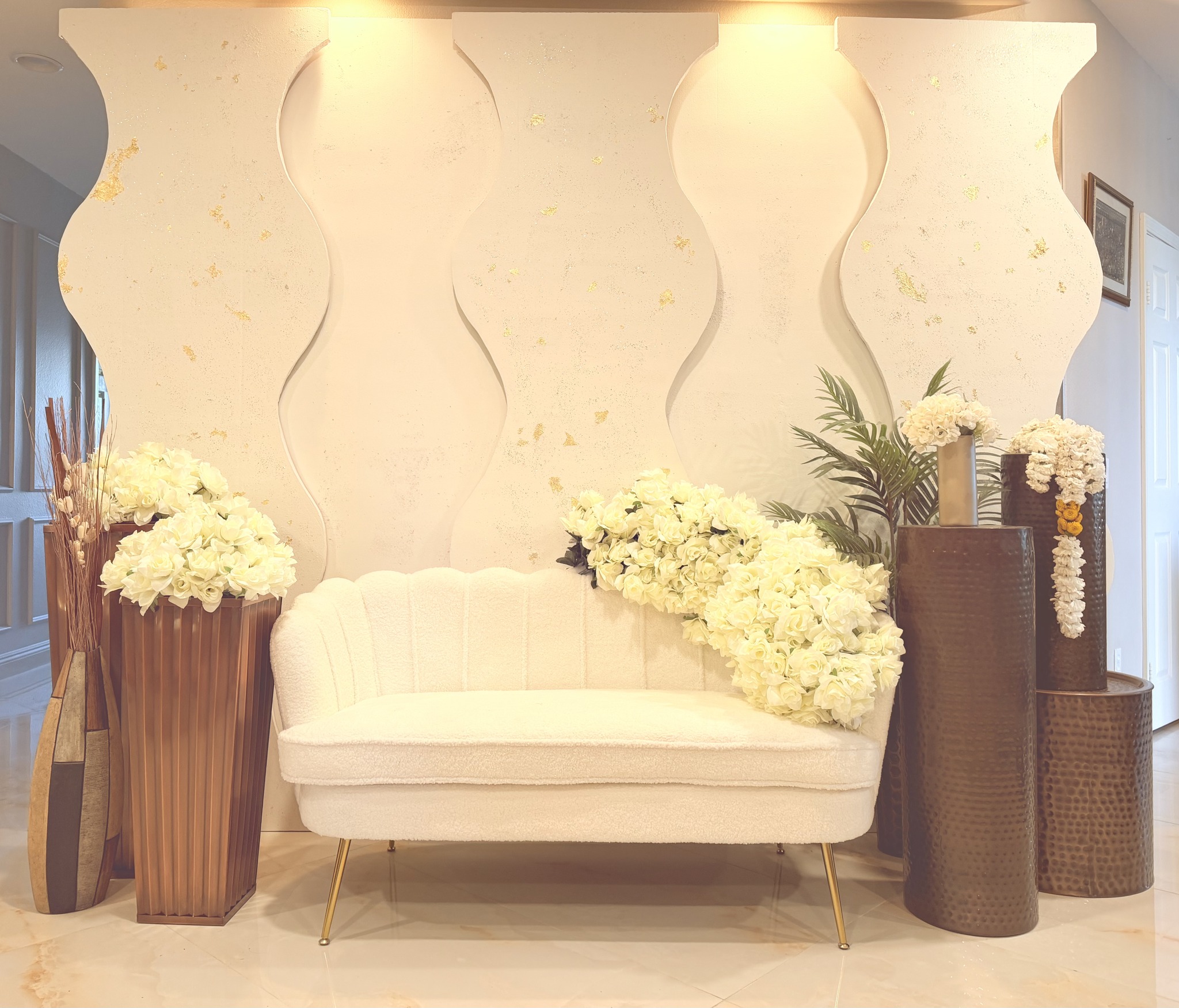 White floral arrangement with loveseat